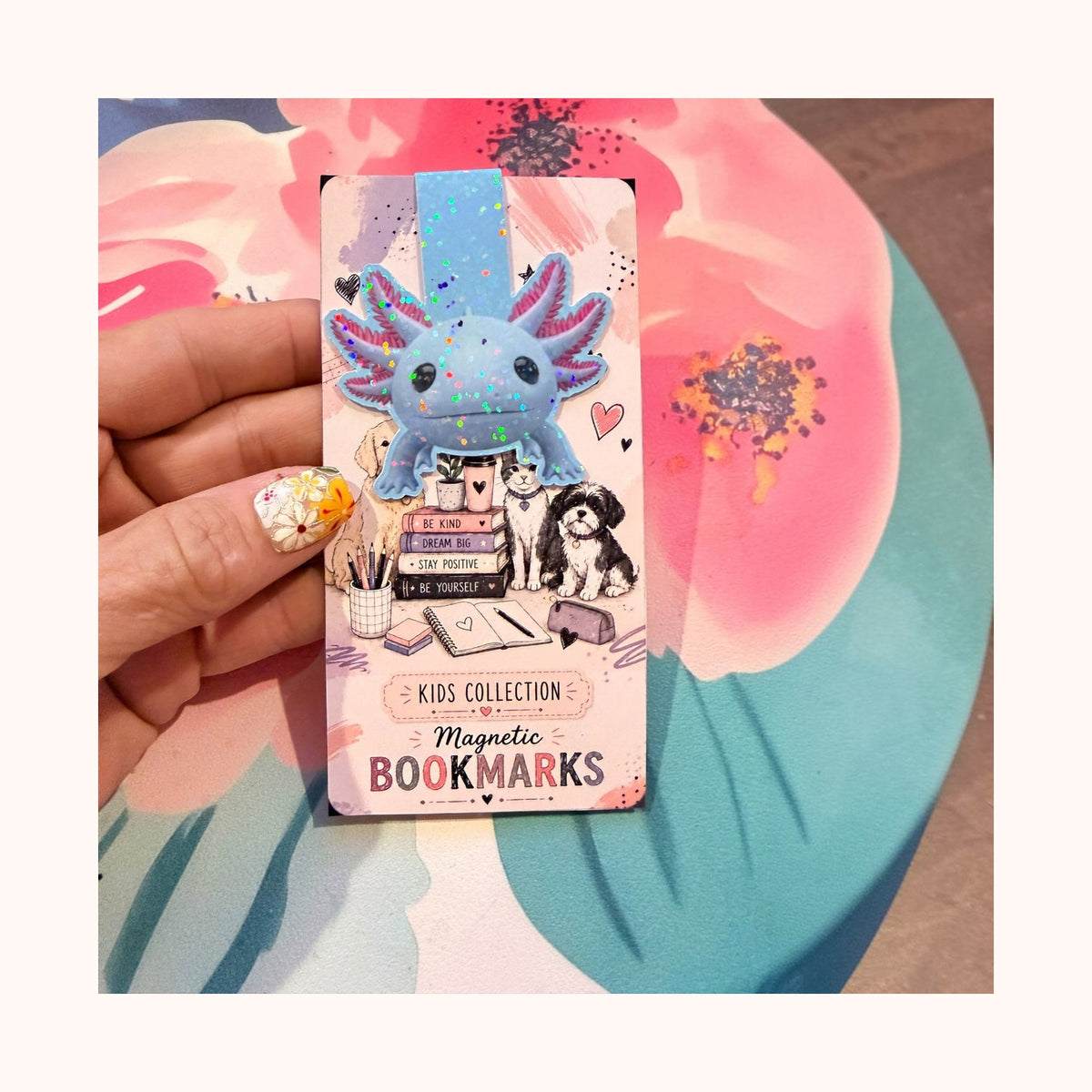 Full view of blue glitter axolotl magnetic bookmark with space around the product